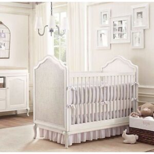 white painted baby crib cot with fabric