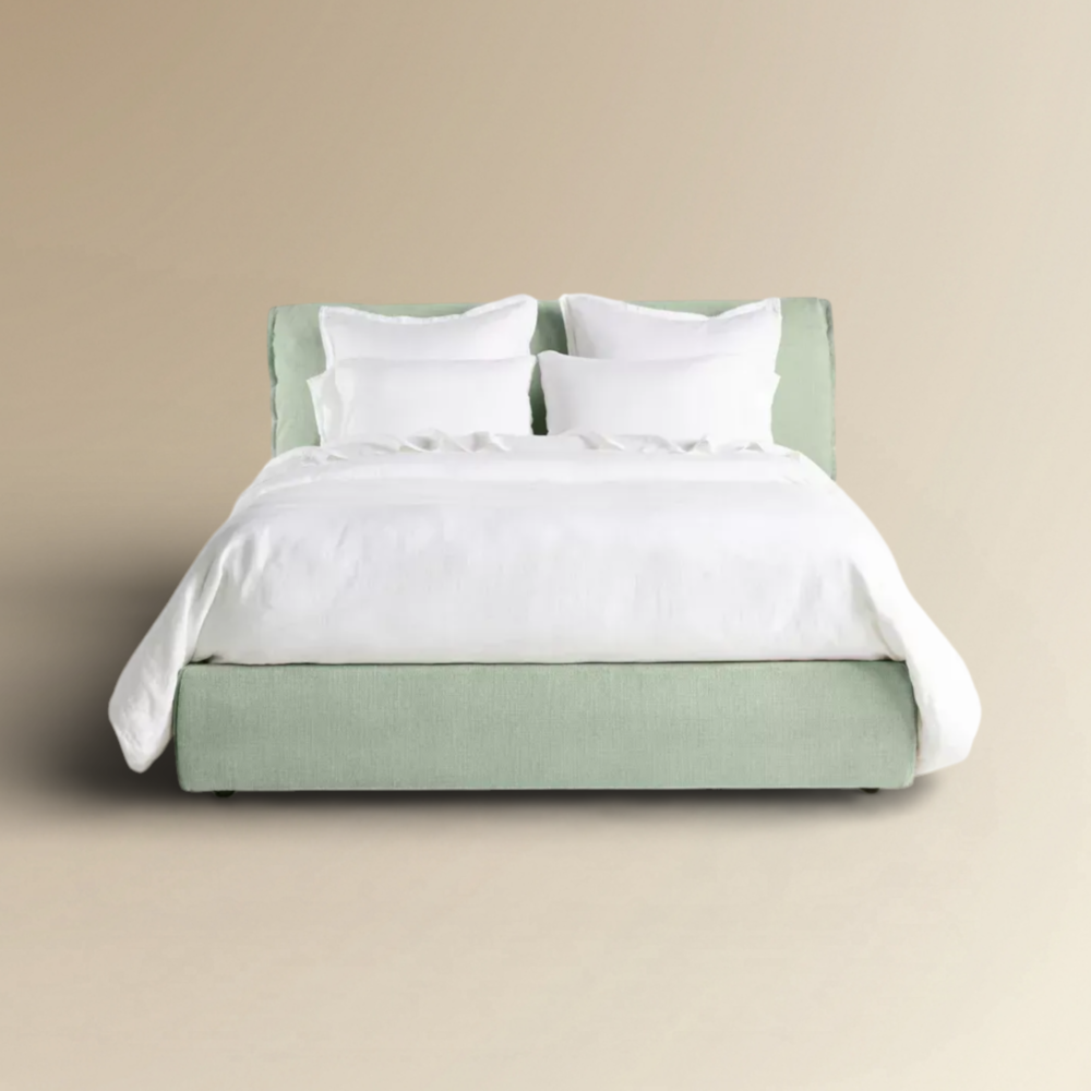 York contemporary sage green upholstered platform bed with a high cushioned headboard.